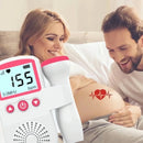 Casal feliz usando Baby Doppler Fetal para ouvir batimentos cardíacos do bebê na barriga
