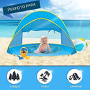 Barraca para bebê azul com proteção solar na praia com bebê sorrindo e brinquedos na areia