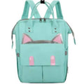 Bolsa Maternidade FlexiBag em tom verde água com design de gato para mamães modernas e práticas