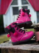 Coturno Infantil Feminino rosa com laços e pompons, ideal para meninas fashionistas