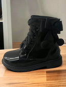 Coturno Infantil Feminino preto com lacinho e acabamento brilhante, ideal para estilo e conforto das crianças