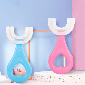 Escova Dental Bebê 360 Graus em silicone nas cores azul e rosa para higiene bucal infantil