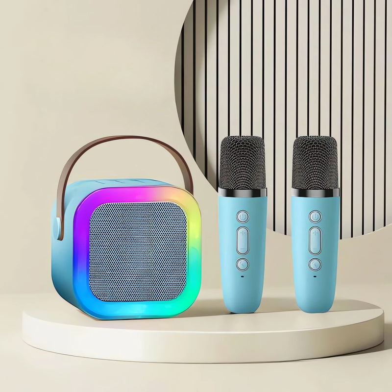 Caixa de som azul com iluminação colorida e dois microfones para Karaokê Infantil