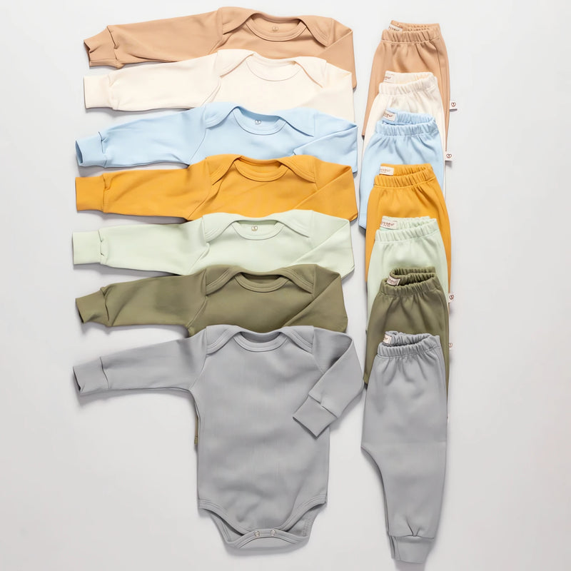 Kit body manga longa bebê em várias cores com calças combinando para conforto e estilo