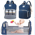 Mochila Bolsa Maternidade azul com compartimentos inteligentes para mamadeiras e berço portátil para bebês