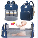 Mochila Bolsa Maternidade azul com compartimentos inteligentes para mamadeiras e berço portátil para bebês